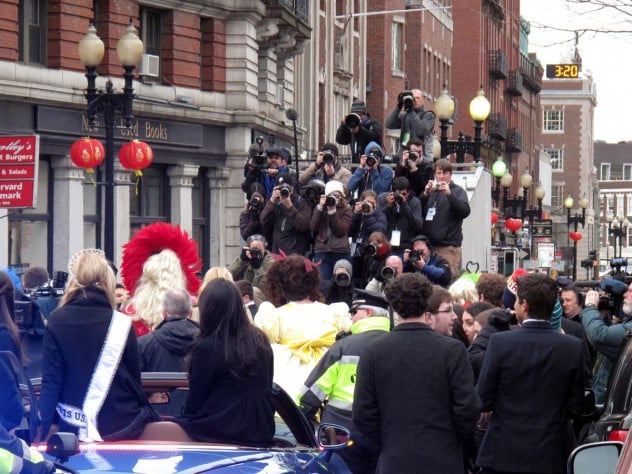 Photograph by Harvard Magazine/LL The media float snapped photos as Danes paraded down Massachusetts Avenue.