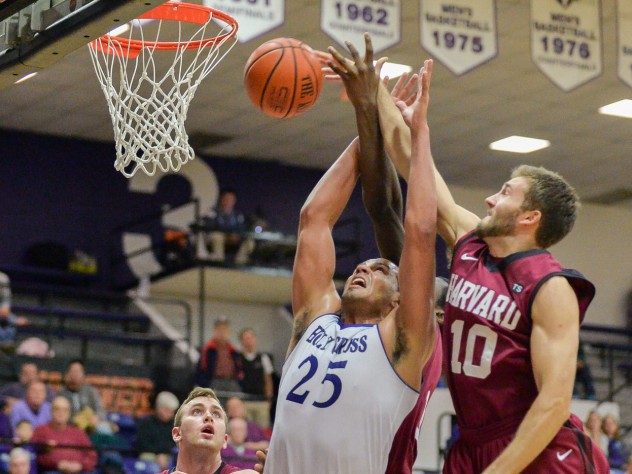After missing the previous contest against Vermont with a knee injury, senior Patrick Steeves (shown in action against Holy Cross) returned in fine form, scoring 20 points, including a team-high 13 points in the first half, to help boost the Crimson over the Big Green.