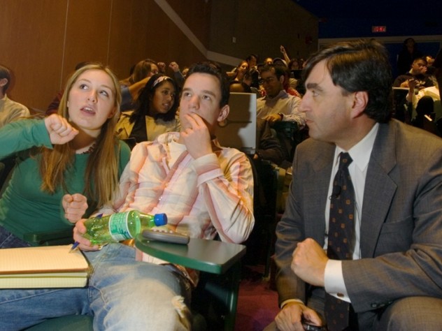 Photograph by Jon Chase / Harvard News Office In 2006, Mazur introduced wireless polling in his introductory physics course, during which these photographs were taken. Here Chelsey Forbess ’07 and Jonathan Paul ’07 discuss results with Mazur...