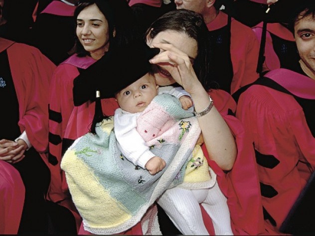 Photograph by Jim Harrison Maria V. Mavroudi, Ph.D. ’98, of Berkeley, California, caps her son George.
