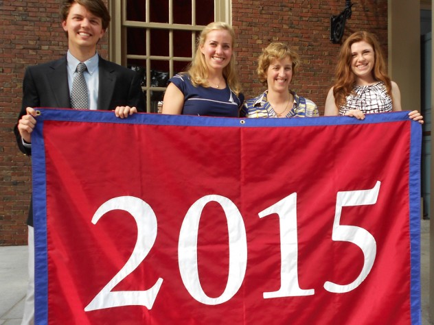 Photograph by Justin Lanning Holding their blue-trimmed class banner, sophomore class Undergraduate Council representatives Chris Smiles (at left) and Ryley Reynolds flank Catherine Katz ’13 and associate dean of Harvard College Joan Rouse. Katz first proposed a sophomore class event to administrators. Smiles and Reynolds are also members of the Harvard Alumni Association’s Building Community Committee.