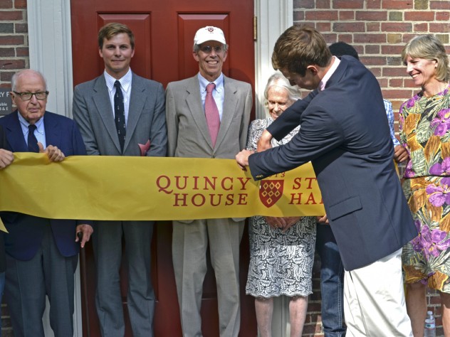 Photograph by Harvard Magazine/JM Geyser University Professor emeritus Henry Rosovsky (at left) and members of the Stone family, including grandson Robert Stone ’12, Gregg Stone ’75, J.D. ’79, Marion (Rockefeller) Stone, and Jennifer P. Stone ’80, M.D. ’86, together with Quincy residents Franco Iudiciani ’16 (far left) and Onyeka Nnaemeka ’16 (obscured at right), witnessed grandson Eric Green ’16 cut the ribbon that officially opened Stone Hall’s F entry.