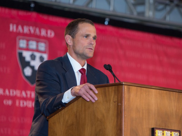 Photograph by Lisa Abitol/Harvard Graduate School of Education Dean James Ryan speaks to the more than 1,300 attendees at the HGSE campaign launch, held under a tent in Radcliffe Yard.
