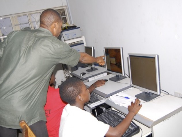 Courtesy of Oluwadara Johnson Computer education was also part of the program. For Adewale Oluwadunni, foreground in white shirt, this class was the first time she ever laid eyes on a computer.