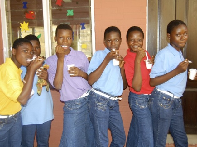 Courtesy of Oluwadara Johnson The girls take a break from activities for a snack. For some, this was the first time they ever tasted ice cream.
