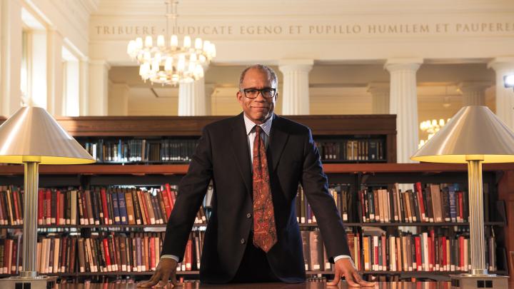 Randall Kennedy at the table where he does his research in the reading room of Harvard Law School&rsquo;s Langdell Library 