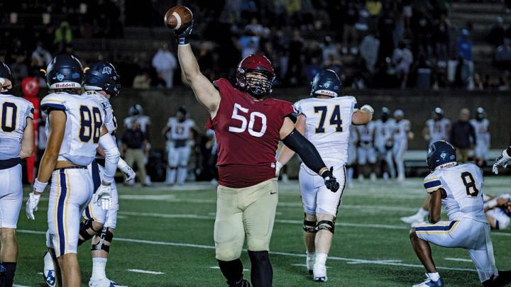 Defensive lineman Thor Griffith, a junior, celebrating  two sacks and a game-high nine tackles against Merrimack
