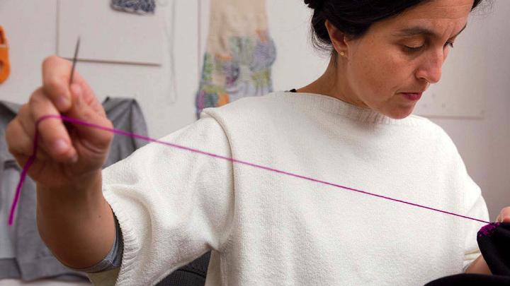 Celia Pym at work with a needle and thread