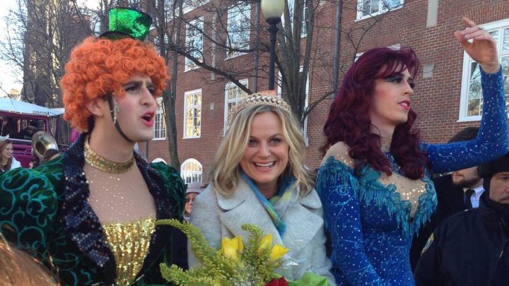 Amy Poehler with members of the Hasty Pudding Theatricals during a parade through Harvard Square