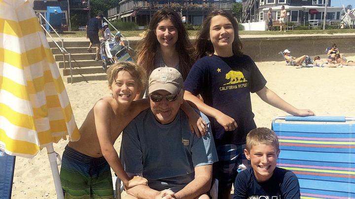 Bill Jenkins, enjoying the beach with his grandchildren last June, joined a clinical study exploring the value of early palliative care after his cancer diagnosis in 2011.