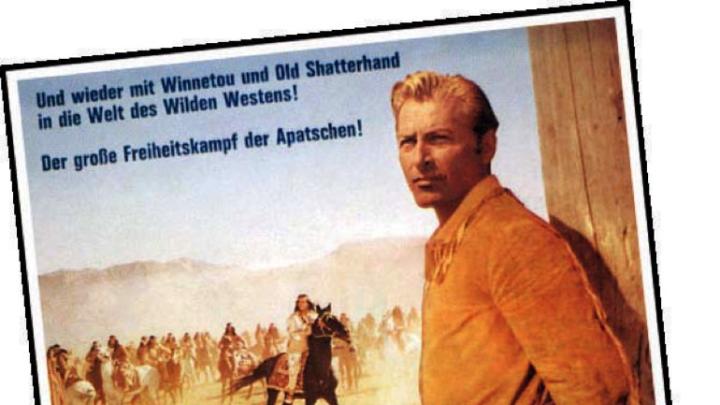 A movie poster advertising Old Shatterhand, showing the frontiersman tied to a stake
