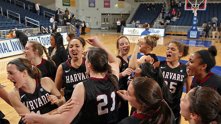 The women's basketball team celebrates their victory over Hofstra last night as they became the first team in Ivy League history to record a win in the WNIT.