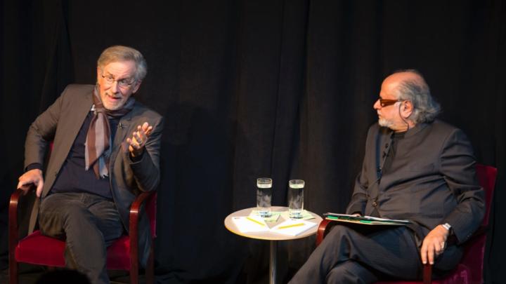 Steven Spielberg, left, converses with Mahindra Humanities Center director Homi Bhabha.