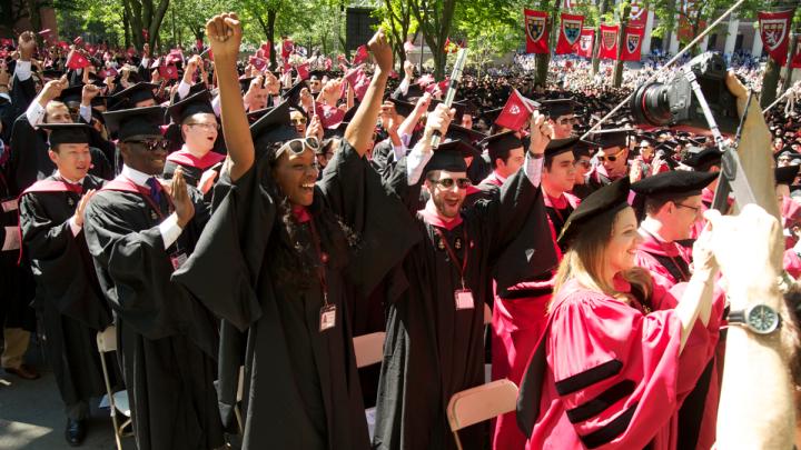 College and doctoral students express their sentiments, loudly, at Commencement.