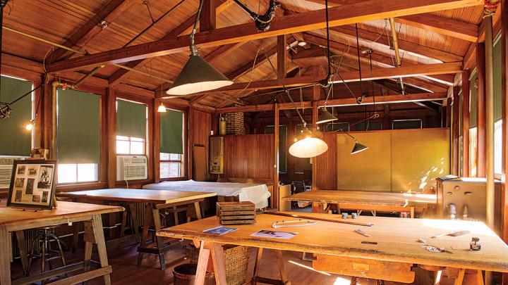 The enduring, simple beauty of Olmsted&rsquo;s landscapes is echoed in the rustic wooden interior of the restored drafting room at Fairsted.