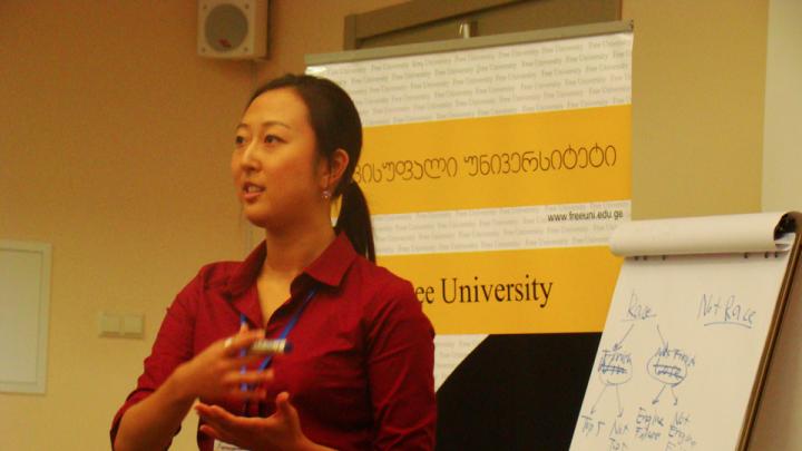 Instructor Sujin Jang leads a case study discussion at ISS 2012.