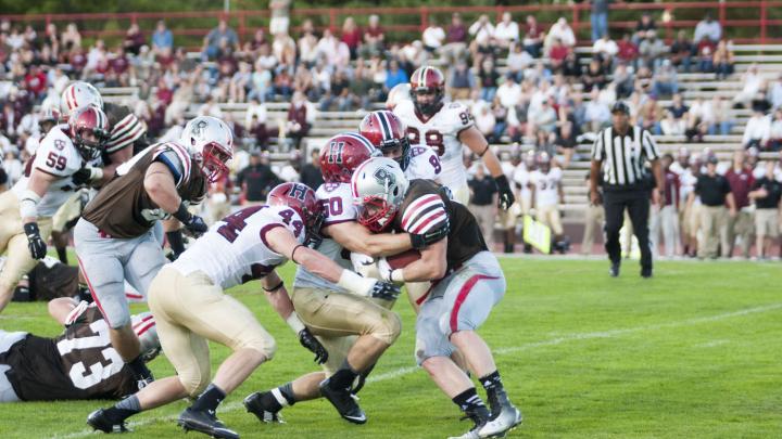 Ever in the Brown backfield, Scott Peters (44) and Connor Sheehan (50) headed a hard-hitting crew that limited the Bears to 88 yards on the ground.