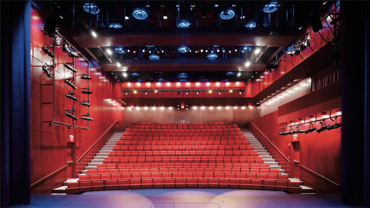 The intimate performance space, seen from the stage, is equipped with thoroughly modern theater technology.  
