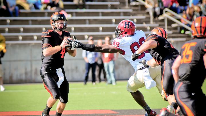 Tigers quarterback Quinn Epperly, who had tormented the Crimson two years’ running, this time was caged by onrushing Zack Hodges ’15 and other Harvard defenders.