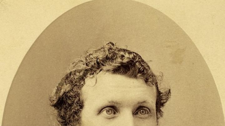 A formal portrait of Muir circa 1875