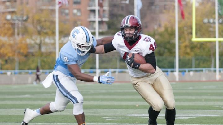 As the Columbia game wound down, tight end Ben Braunecker (48) caught a 13-yard pass from senior quarterback Michael Pruneau to set up Harvard’s final touchdown of the day. The Lion defender is cornerback Malcolm Thaxton.