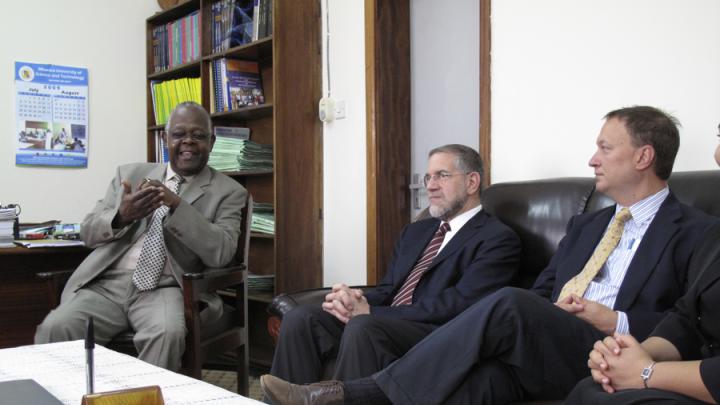 Harvard University provost Steven E. Hyman visited Uganda in August 2009 to learn about the partnership between Harvard and MUST. Here, Hyman (center) meets with Bangsberg (right) and vice chancellor Kayanja (left). 