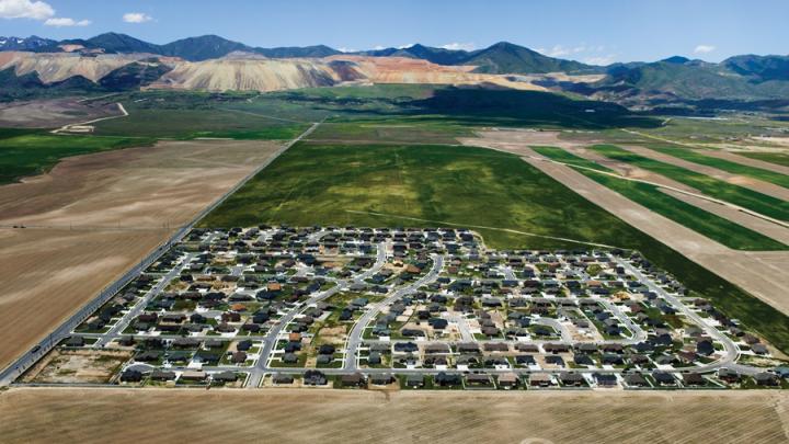 South Jordan, Utah - Isolated exurban communities built on cheap agricultural land depend on cars for nearly every activity. To access urban centers, residents often have to commute long distances. Because the land is virtually undeveloped, all aspects of modern infrastructure (water, sewer, electric, and roads) must be extended.