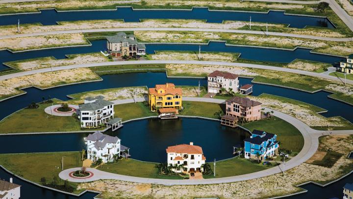 Homes in Galveston, Texas, are built on wetlands. MacLean fears that, if the sea level rises, communities like this one will be especially vulnerable.
