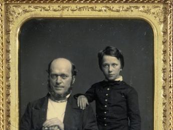 Henry James Sr. poses with his son Henry Jr. at Mathew Brady&rsquo;s studio in New York City, 1854.