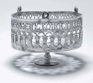 An openwork silver lamp