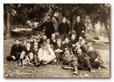  Madame Schliemann hosted this gathering of eminent persons at Daphni Monastery outside Athens. Connolly, at left, is leaning toward young Prince Andrew, father of Queen Elizabeth's husband, Philip. Marathon winner Spiridon Loues, in traditional costume, sits cross-legged in the front row, while the stadium architect reclines with his cane and bowler hat.