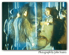Gay-bashers assault Quentin Crisp (John Hurt) in the 1980 film 'The Naked Civil Servant'. Photograph by John Soares.
