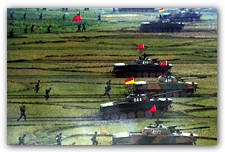Aggressive army: Chinese soldiers maneuver along the coast opposite Taiwan, March 1996.