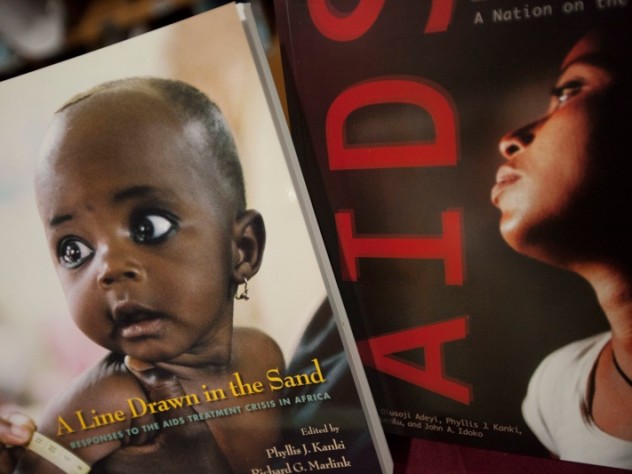 Photograph by Kris Snibbe/Harvard News Office An image from the cover of a book about AIDS treatment in Africa, edited by faculty members Phyllis Kanki and Richard Marlink, who spoke at the "PEPFAR in Africa" conference held at Harvard School of Public Health on January 10.