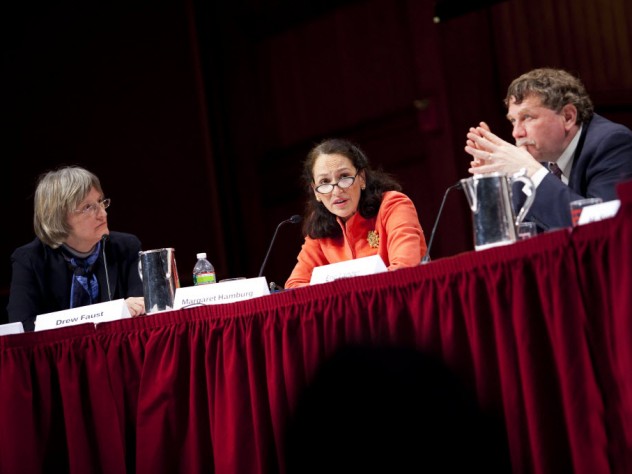 Photograph by Stephanie Mitchell/Harvard Staff Photographer President Drew Faust moderates a February 22 discussion of the human genome map's impact in the 10 years since its first publication. Also shown are panelists Margaret Hamburg ’77, M.D. ’83, commissioner of the U.S. Food and Drug Administration, and Eric Lander, president and founding director of the Broad Institute of Harvard and MIT and professor of systems biology at Harvard Medical School.