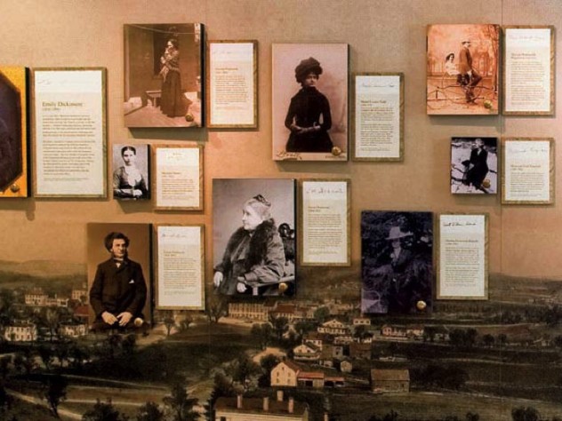 Dickinson family photographs hang on the wallet The Homestead