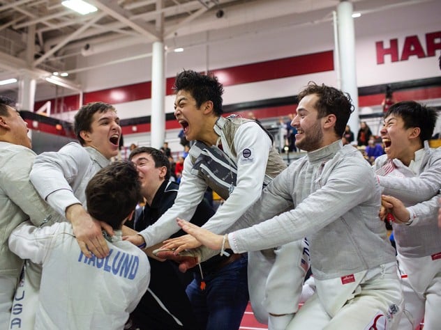 The Harvard men celebrate their championship win.