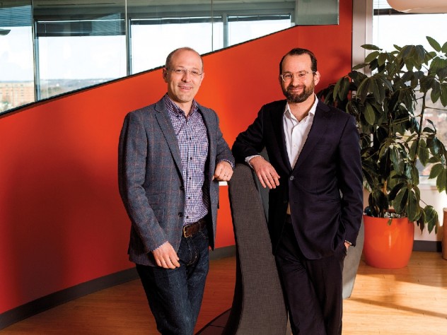 Yates (left) and Laskey have merged their talents—computer science and political communications—in Opower.