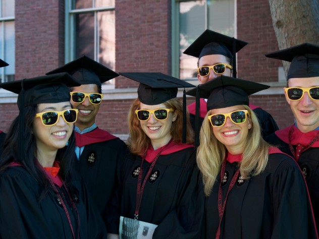 Photograph by Jim Harrison Ready for anything, Harvard Business School M.B.A.s-to-be fend off the sun in their matching "HBS Section J 2012" shades.