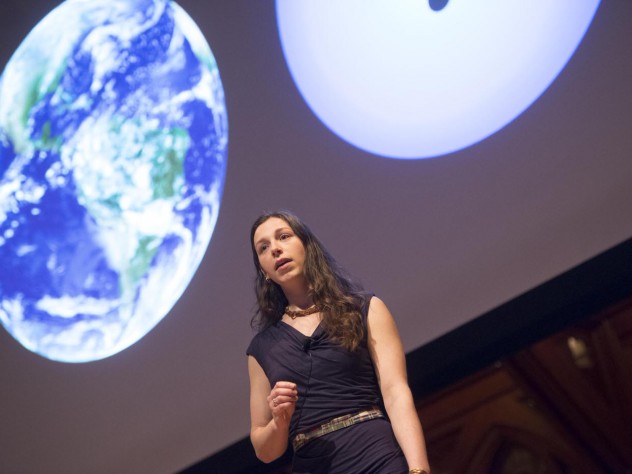 Photograph by Tony Rinaldo/courtesy of the Graduate School of Arts and Sciences Elisabeth Newton, a Ph.D. candidate in astronomy, explains how scientists learn about planets via their stars.