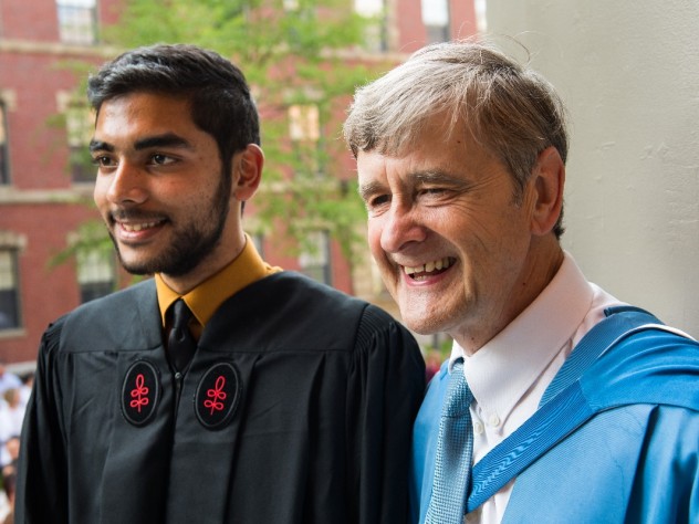 Dean David N. Hempton and a graduating student