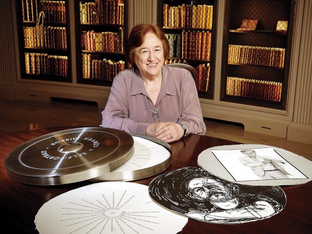 Photograph by Stu Rosner Porter University Professor Helen Vendler in Houghton Library with a copy of the Arion Press edition of John Ashbery's "Self-Portrait in a Convex Mirror"
