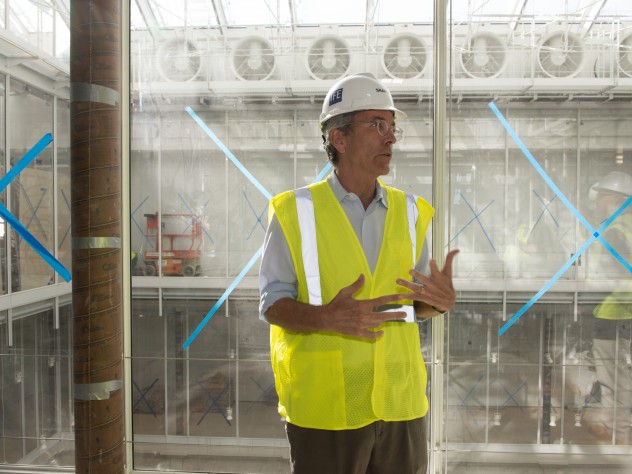 Photograph by Jim Harrison Cabot director of the Harvard Art Museums Thomas Lentz. Behind him is another example of architect Renzo Piano’s penchant for exposing a building’s systems: the exhaust fans for the atria.
