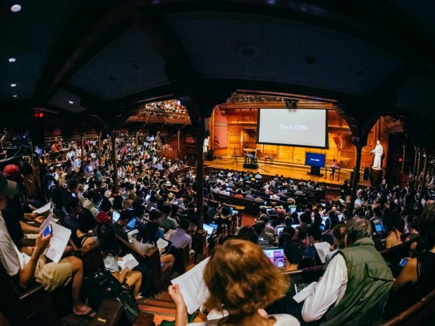 Photo of Harvard students attending CS50 in Sanders Theatre