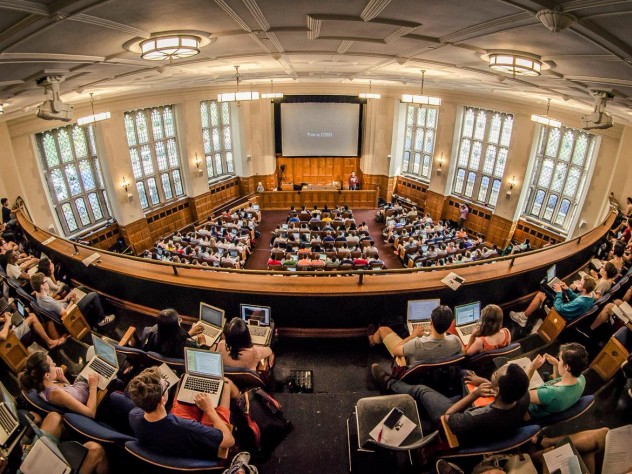Photo of Yale students attending CS50 in the Yale Law School auditorium