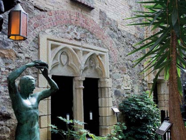 Castle courtyard with statue and stone work