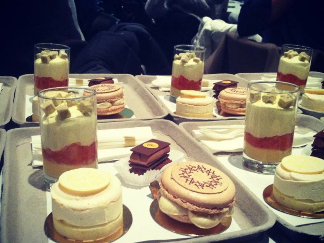 Photograph by Harvard Magazine/LL The four desserts—a lemon cake, a macaron, yuzu wasabi gelée with fresh grapefruit confit and mascarpone cream, and a milk-chocolate-and-hazelnut treat