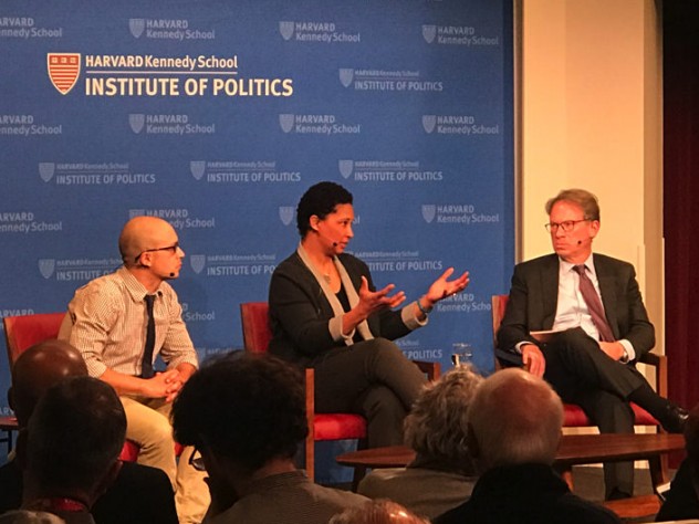 The three panelists on stage at the Kennedy School.