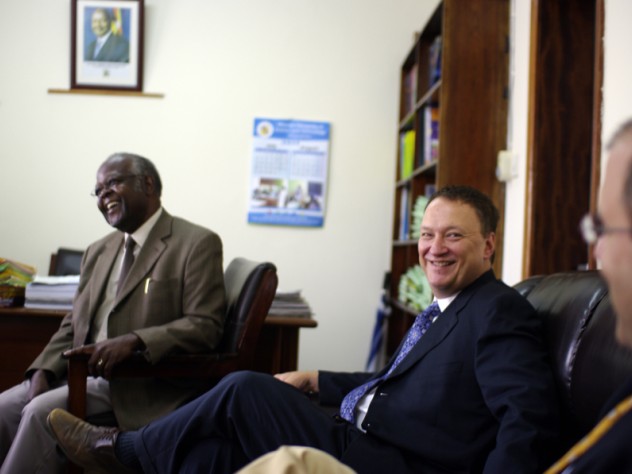 Photograph by Ian MacLellan David Bangsberg (center) meets with Frederick Kayanja, vice chancellor of Mbarara University of Science and Technology (MUST) in Mbarara,Uganda, in Kayanja's office.