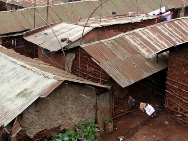Photograph by Tugela Ridley A web of TV antennas and electrical wires festoons Kibera’s rooftops. It is reputed to be Africa’s largest slum, but no one knows for sure: estimates of the number of people living in this crescent-shaped expanse of land the size of New York’s Central Park range from 300,000 to 1.3 million.